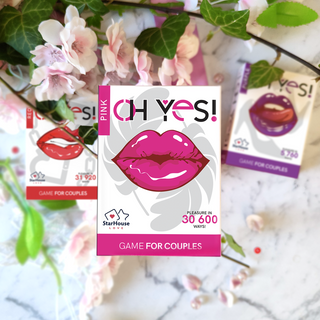 Oh Yes Pink couples game trilogy laydown with flowers