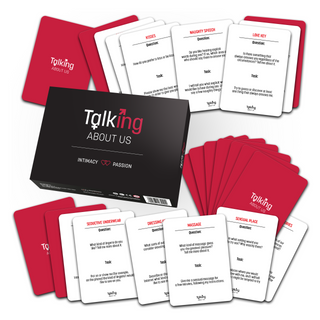 Lifestyle product photo showing packaging and cards for couples game